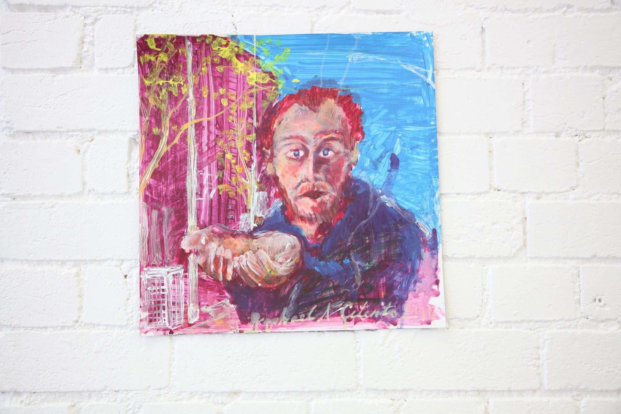 A painted portrait of a man holding a baby, displayed at the Photovoice exhibition
