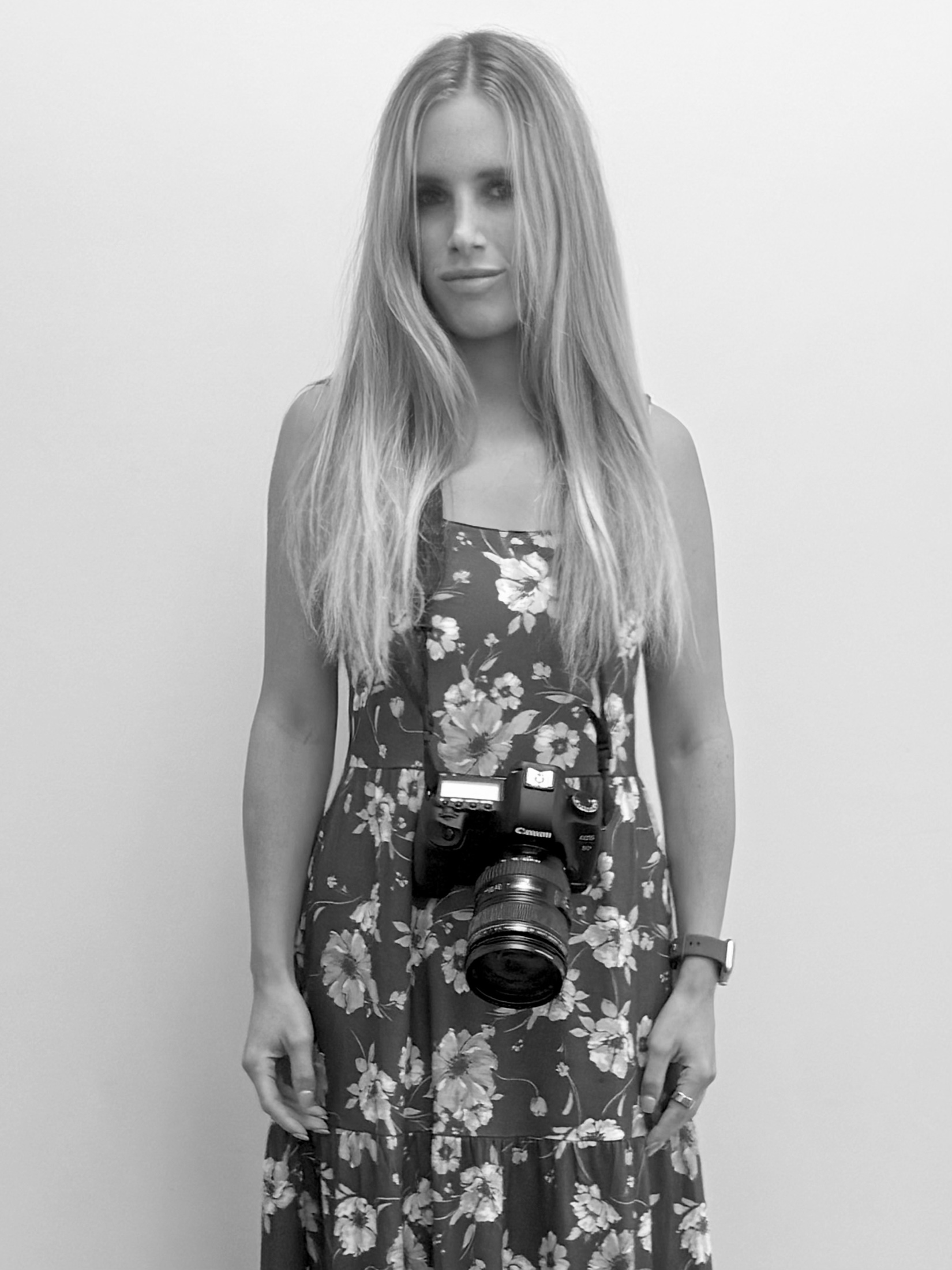Portrait of Tara Fallon with her camera